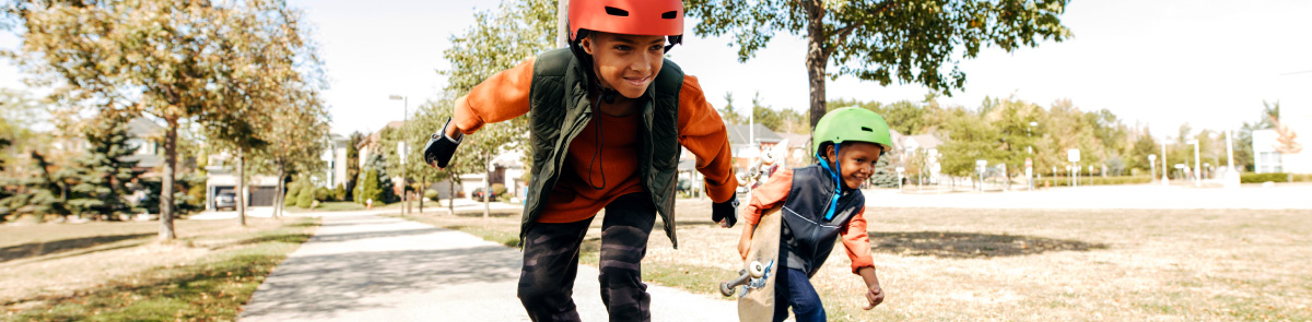 Two kids skateboarding